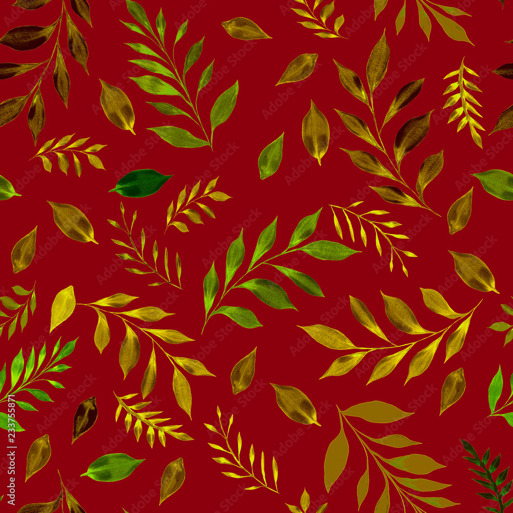 Fototapeta premium Green and brown leaves over a dark red color