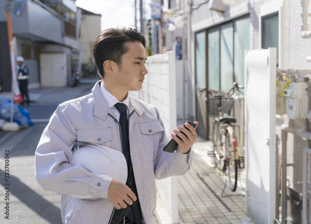 Fototapeta premium ビジネスマン スマートフォン