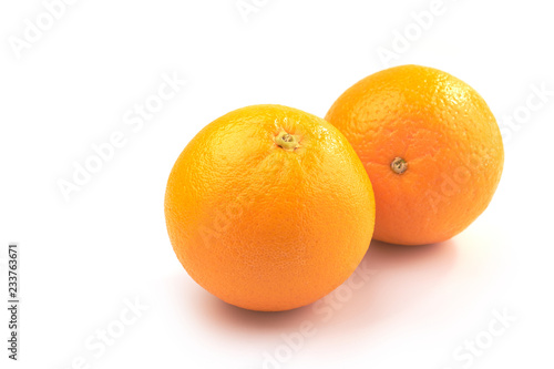 Two orange fruit on white background.