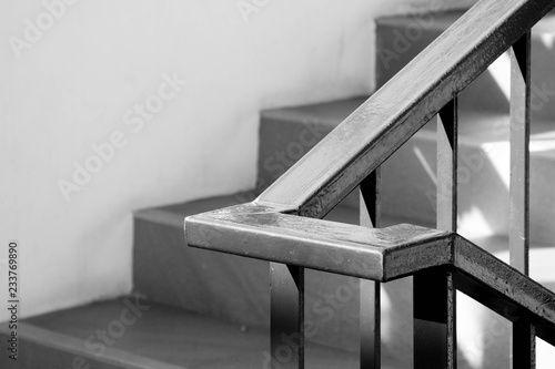 Tableau sur toile closeup steel staircase in residential house - monochrome