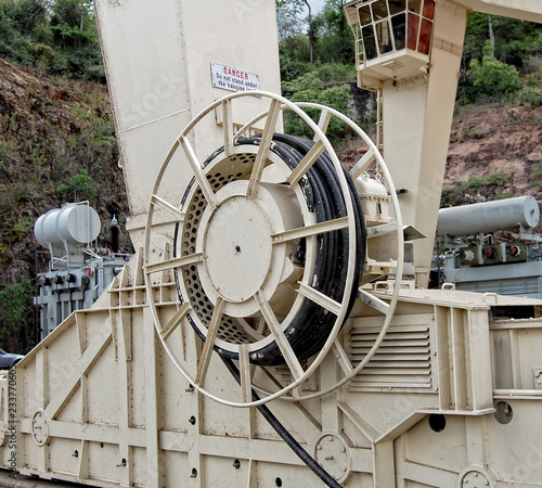 Equipment of Hydroelectric Power Station. Electrical cable wound on a wheel. Power plant. Ghana, Volta, Akosombo - March 21, 2013