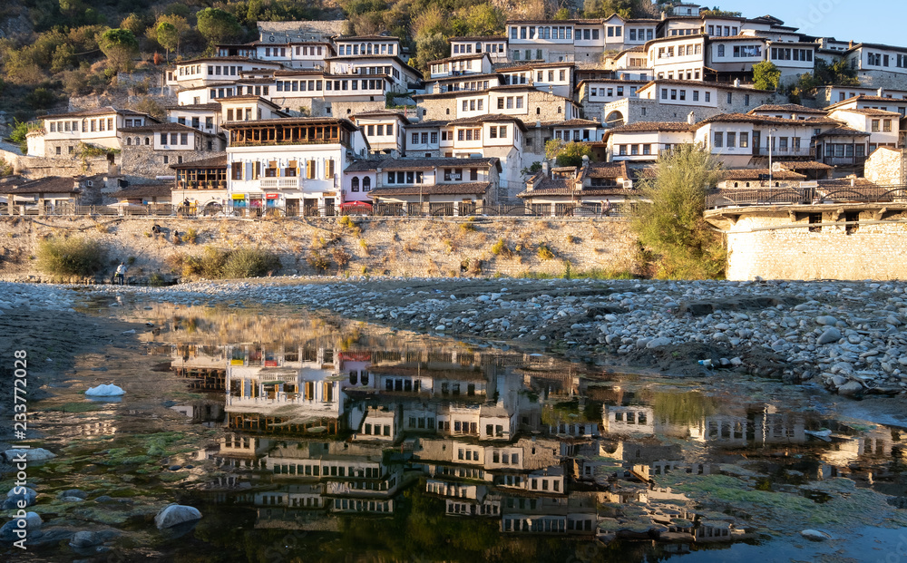Views of Berat Albania, the city of thousand windows a Unesco world heritage site reflecting in Osum river