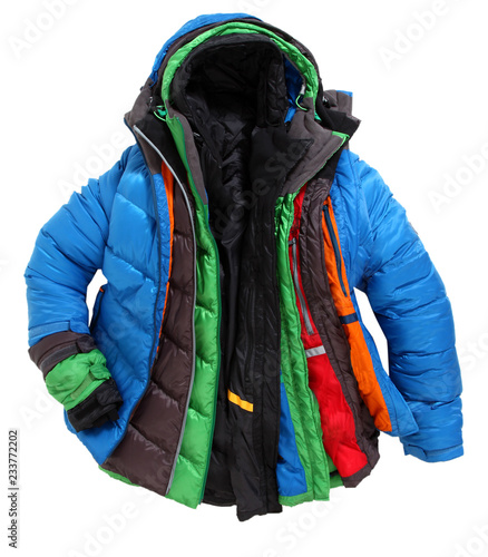 Colorful winterjackets one above the other layered clothing