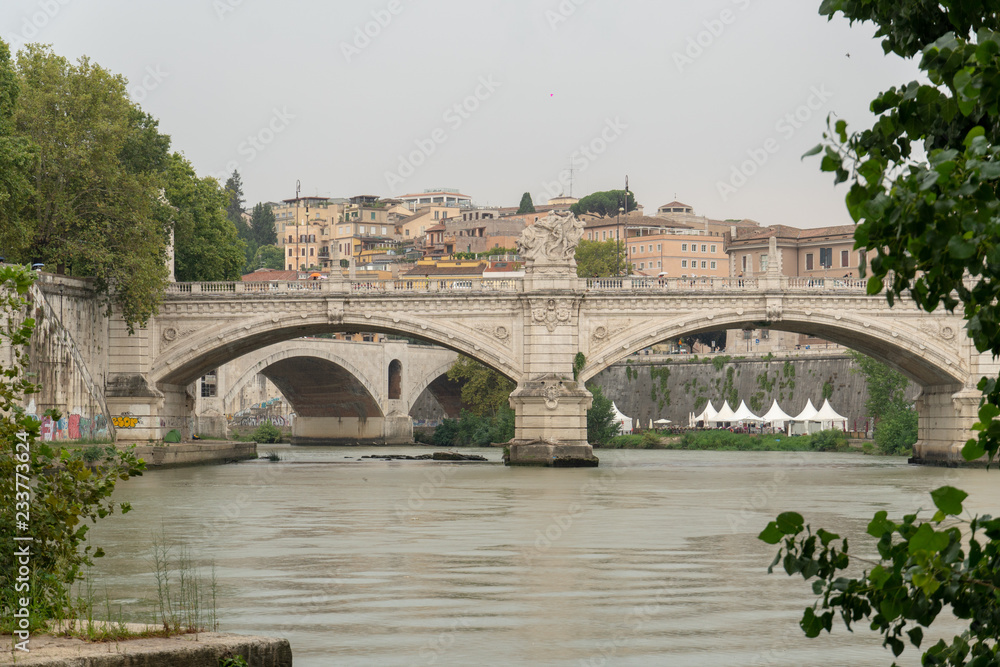 Ponte Vittorio Emanuele II, a bridge in Rome across the Tiber connecting the historic centre of Rome, Italy, with the rione Borgo and the Vatican City Ponte Vittorio Emanuele II, a bridge in Rome across the Tiber connecting the historic centre of Rome, Italy, with the rione Borgo and the Vatican City