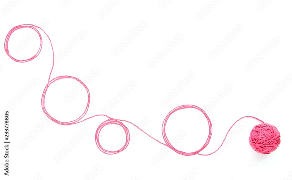Abstract background with cotton thread circles and thread ball. Circles of pink thread isolated on white background. Abstract background with cotton thread circles and thread ball. Circles of pink thread isolated on white background.