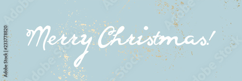 Merry Christmas cute calligraphic white text vector cute calligraphy banner, header or poster. Blue pastel gold rough textured background.