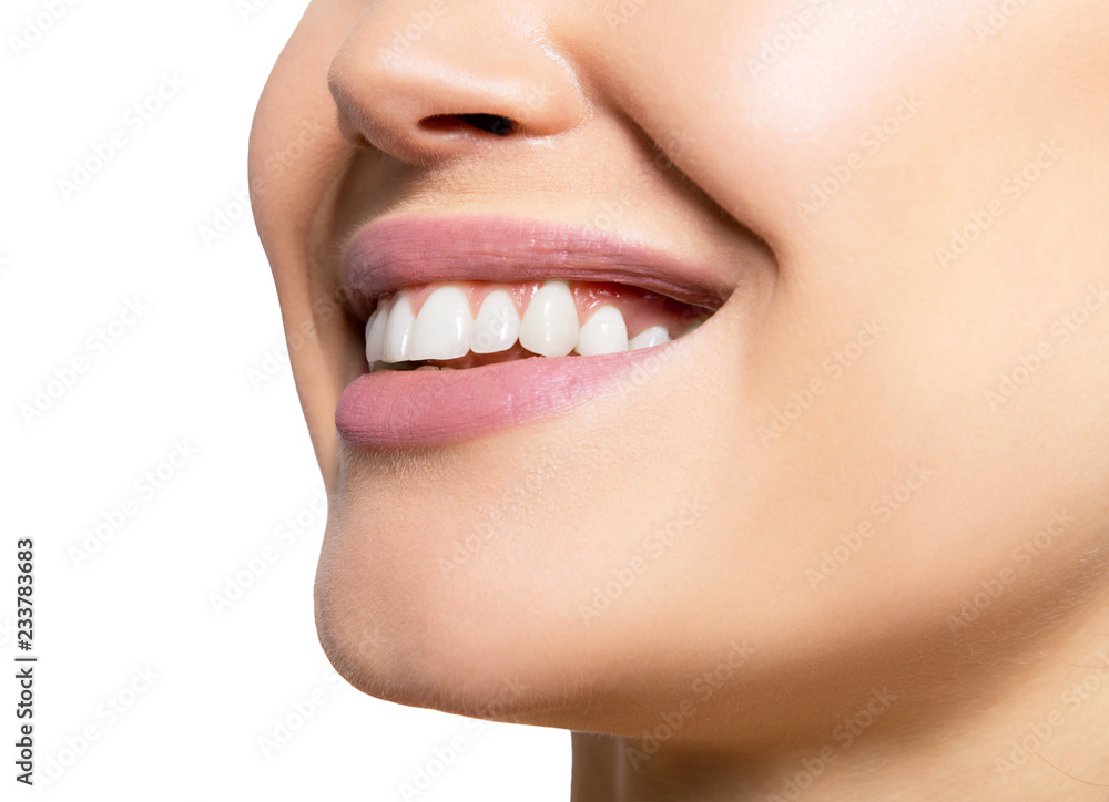 Smiling happy woman. Laughing female mouth with great teeth over white background. Healthy beautiful smile. Teeth health, whitening, prosthetics and care.