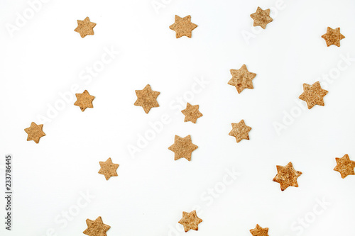 Gingerbread cookies pattern on white background. Flat lay, top view Christmas, New Year concept.