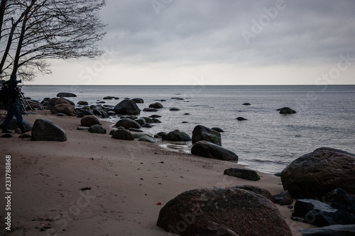 Fototapeta Naklejka Na Ścianę i Meble -  rocky coastline in Latvia with flow water in the sea and large rocks