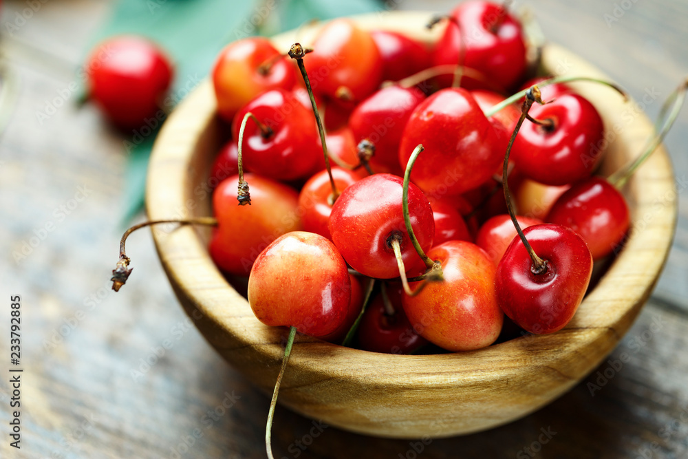 sweet cherries on wooden background sweet cherries on wooden background