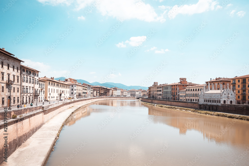 River Arno which goes through famous italian town Pisa