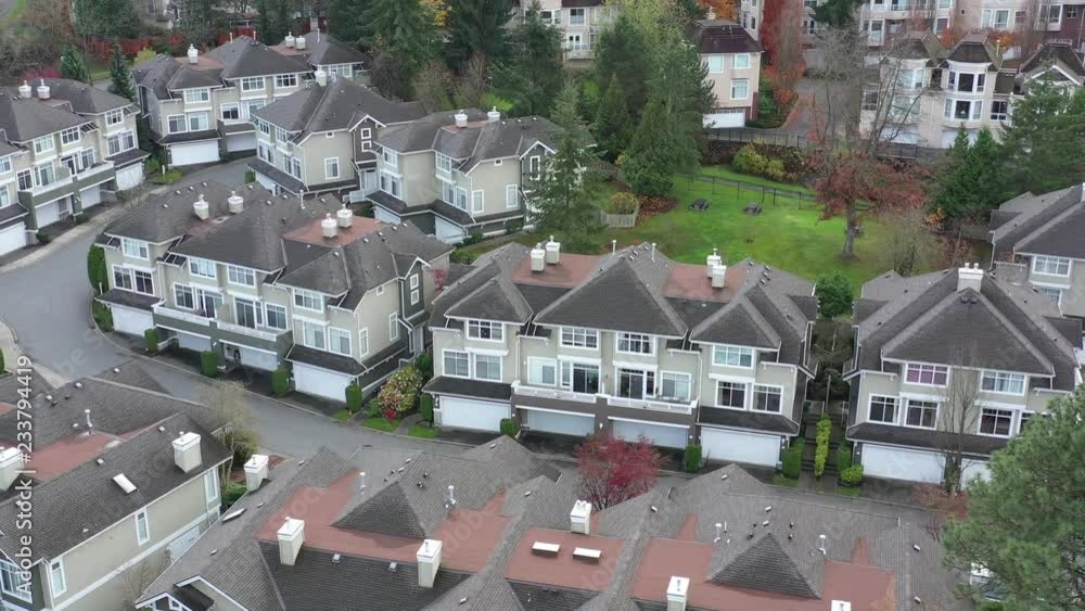 Perfect neighbourhood. Houses in suburb at Summer in the North America. Luxury houses with nice landscape. Aerial drone view. Perfect neighbourhood. Houses in suburb at Summer in the North America. Luxury houses with nice landscape. Aerial drone view.
