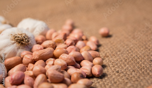 Group of Garlic and groun nuts on sackcloth for food. photo