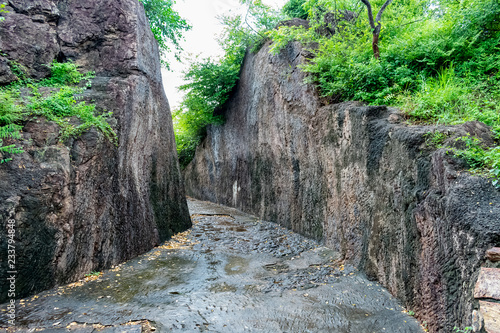 Awesome snap of  rock pathway at budhhiest stone hills, build by cut the rock for visit to budhha temple at sankaram village of visakhapatnam district of india, . photo