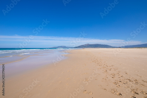 landscape of seashore in beautiful sandy big and lonely beach Los Lances  in Tarifa  Cadiz  Andalusia  Spain