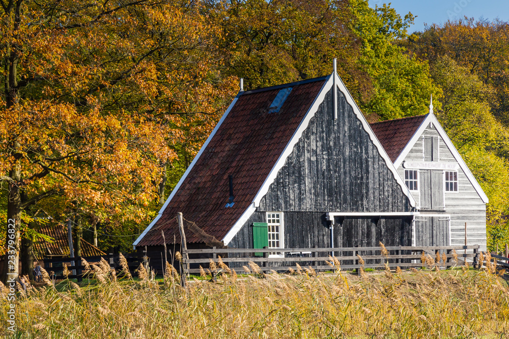 Historic Dutch scene with a wooden barn in the open air museum in Arnhem in the Netherlands