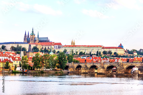 Charlse Bridge and Vltava river view with Prague Castle on the b