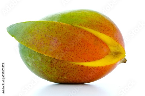 ripe sliced mango isolated on white background