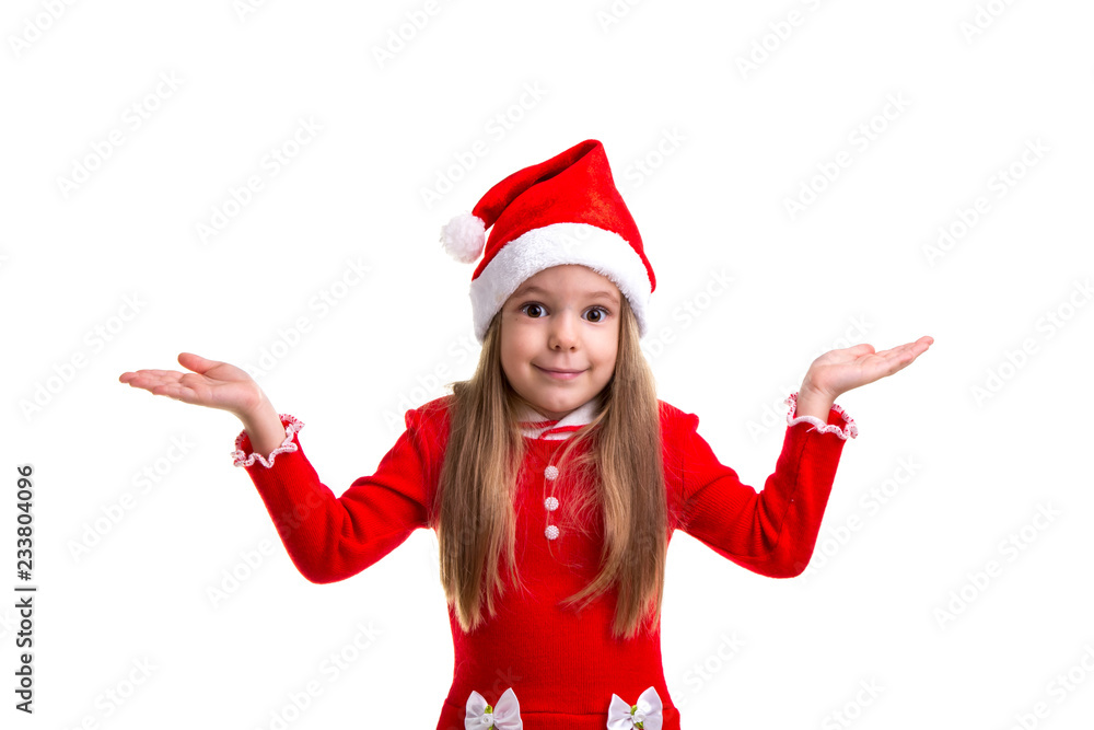 Surprised christmas girl wearing a santa hat isolated over a white background Surprised christmas girl wearing a santa hat isolated over a white background