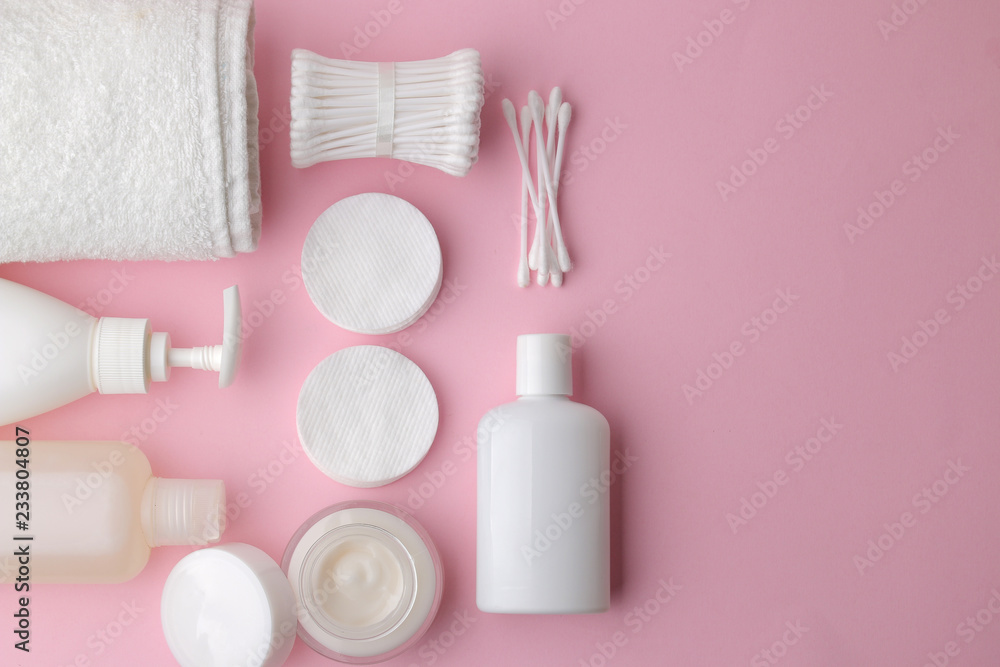 Body and skin care products in white packaging on a pink delicate background.  Personal hygiene products. View from above. Stock Photo | Adobe Stock