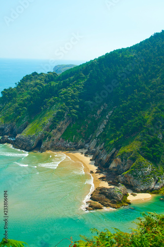 Secluded beach surrounded by amazing cliffs, Estuary of Tina Minor in Cantabria