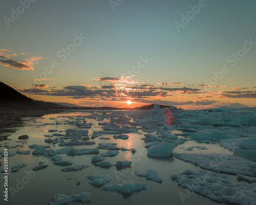 bay of icebergs at sunrise