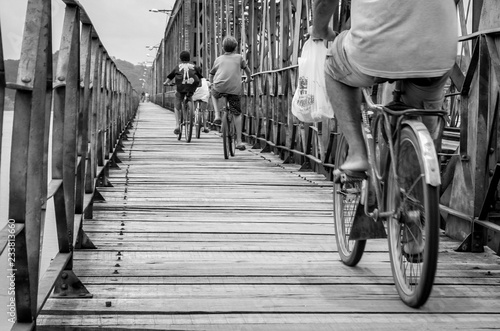 cyclists on bridge