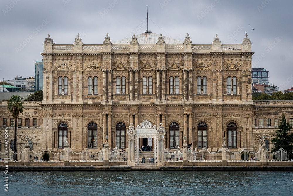 Dolmabahce Palace from the Bosporus with crowds of people in front of it