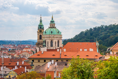 View over historic center of Prague, St. Nicholas Church, red roofs of Prague, Czech republic