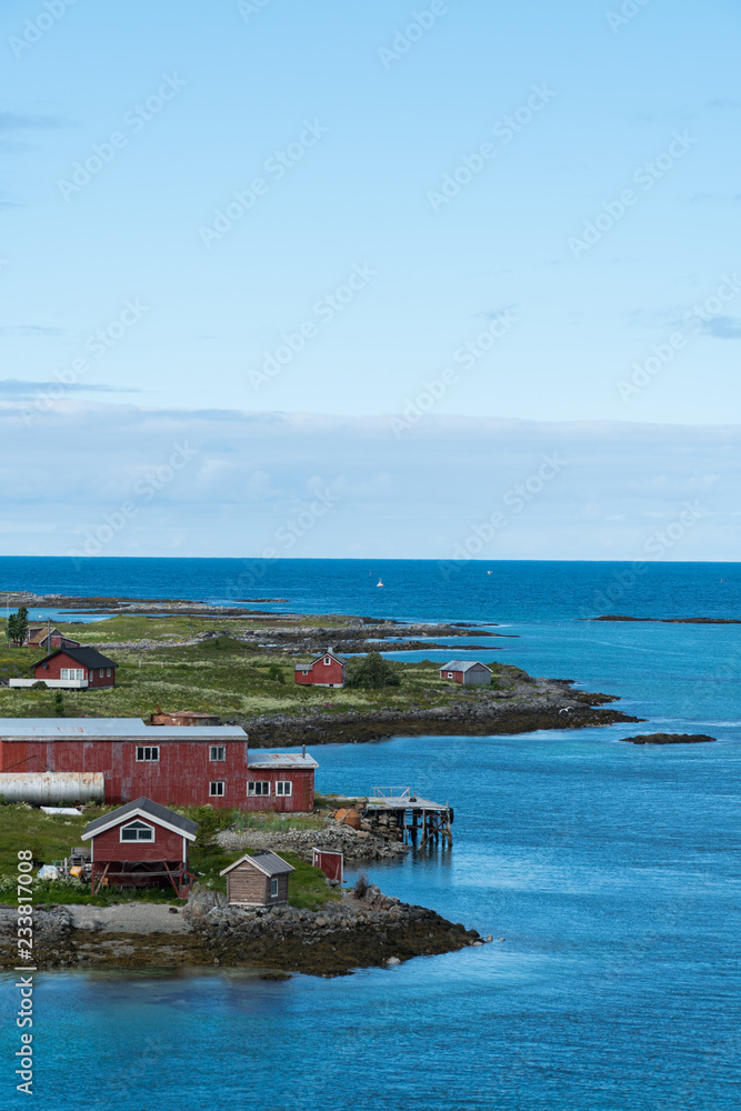 Summer houses next to the sea used for fishing at the Lofoten Islands in Norway