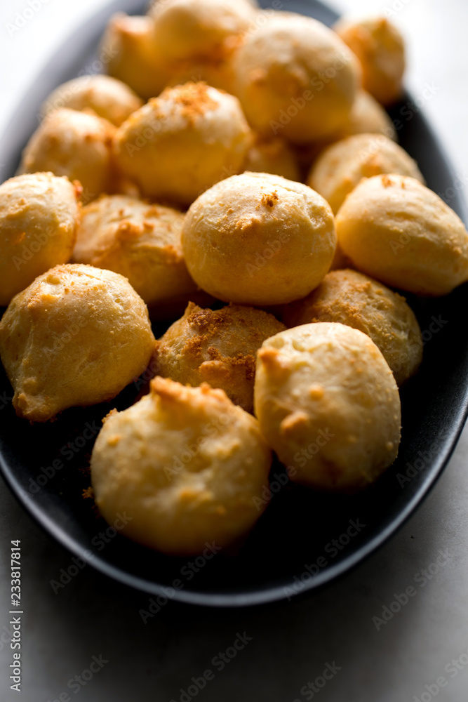 Close up of pancetta and sage gougeres on dish Close up of pancetta and sage gougeres on dish