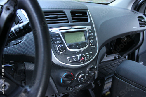 The dashboard of the car, the speedometer close-up.Repair of the car, disassembled the panel, the steering wheel. © Александра Ермоленко