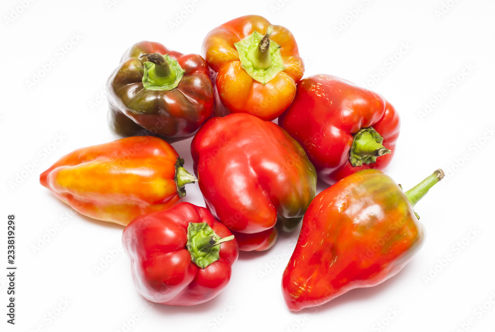 Ripe peppers closeup on white background