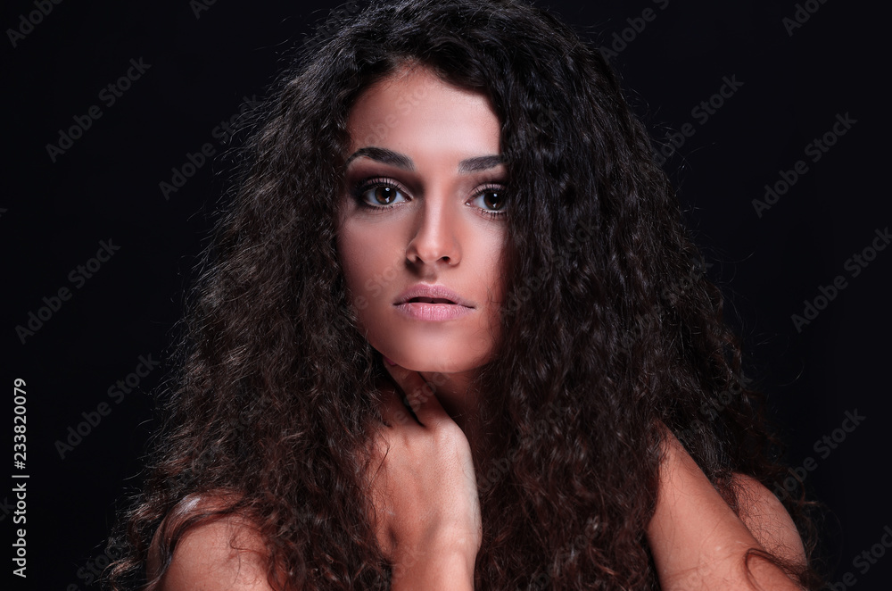 Female model with long shiny wavy hairstyle. Female model with long shiny wavy hairstyle.