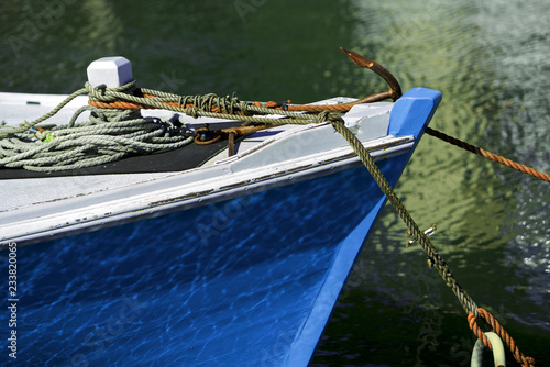 Wooden boat with reflection