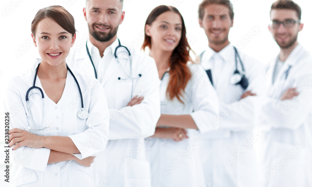 woman-pediatrician on the background of colleagues woman-pediatrician on the background of colleagues