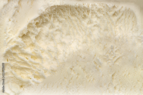 Spooned vanilla ice cream background 