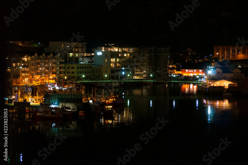 Norway Coast City at Night with port water reflection