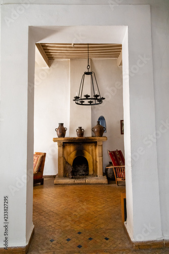Fireplace and hanging light fixture