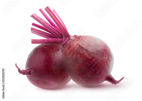 Isolated vegetables. Two whole raw beetroots isolated on white background with clipping path