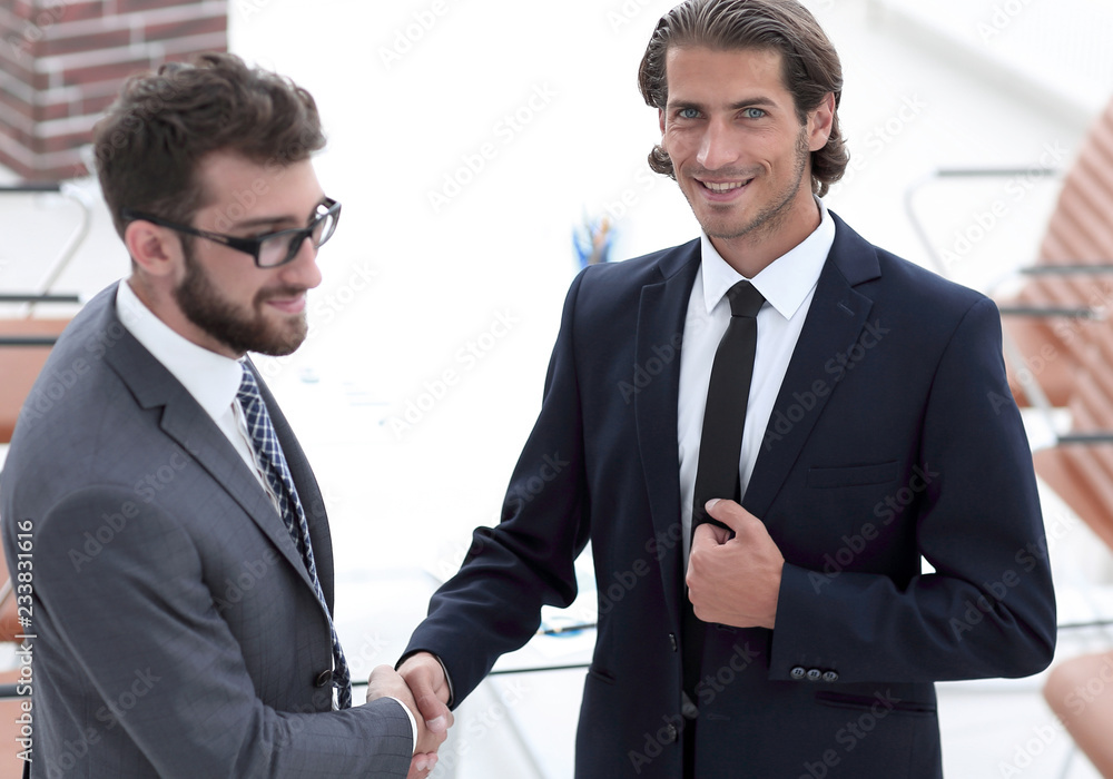 handshake business partners to the conference room