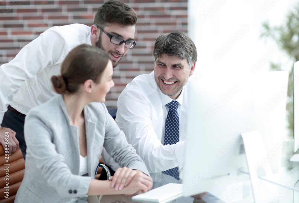 Friendly business team in the office Friendly business team in the office