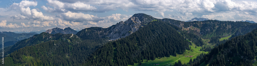 Dramatic mountain landscape from top of Wallberg in Germany with green valleys below Dramatic mountain landscape from top of Wallberg in Germany with green valleys below
