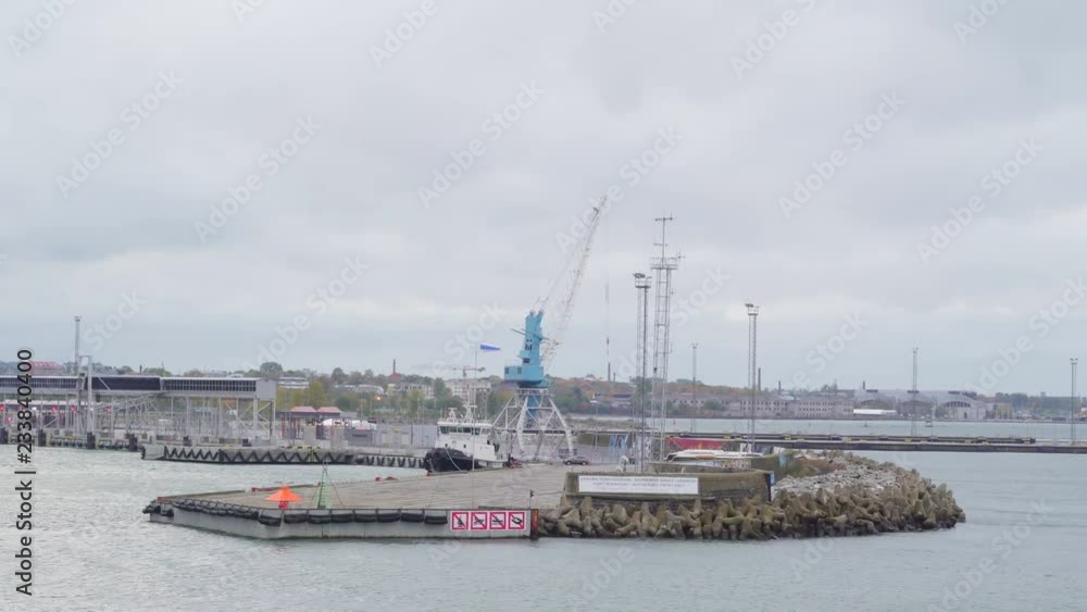 A ledge on the port area in Tallinn Estonia with the tall crane on the area A ledge on the port area in Tallinn Estonia with the tall crane on the area