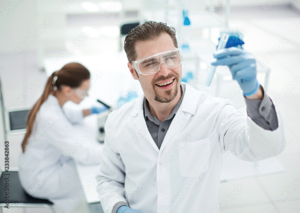 successful scientist checking the results of the examination. successful scientist checking the results of the examination.