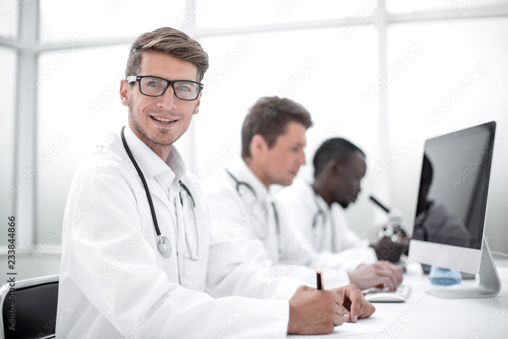 group of doctors conducting laboratory studies group of doctors conducting laboratory studies