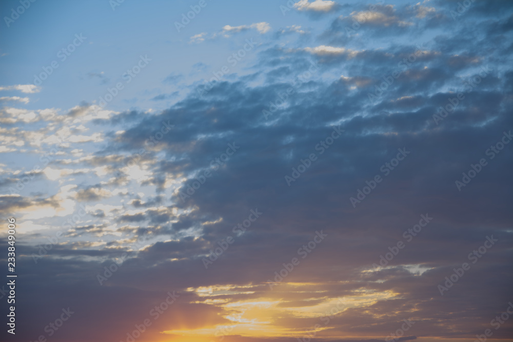 Colorful dramatic sky with cloud at sunset