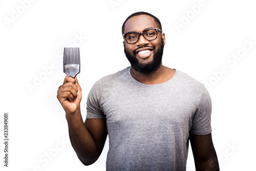 The concept of personal care, men's accessories for the care of the beard and hair, a comb for the beard, attention to detail and a desire to look good. Beauty trends and beard fashion