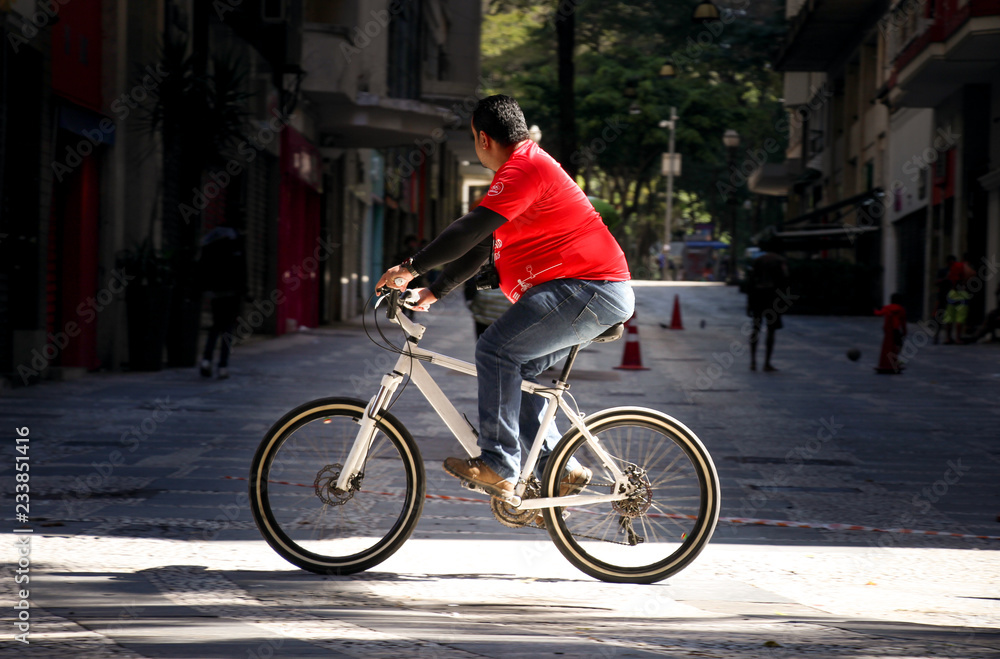 Fototapeta premium man riding a bike