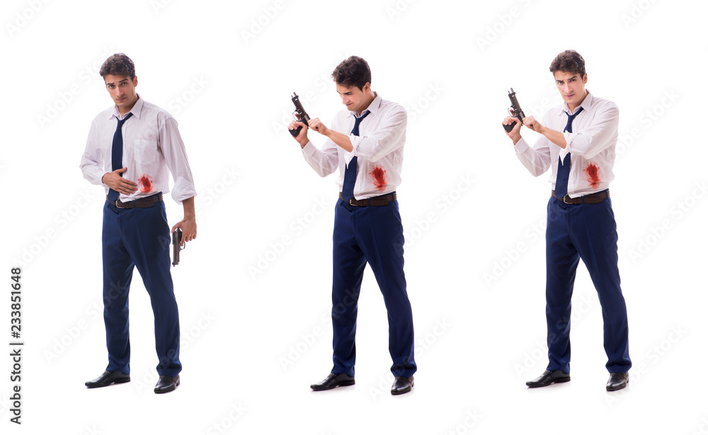 Businessman wounded in gun fight isolated on white Businessman wounded in gun fight isolated on white